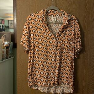 Orange, brown, and white button down